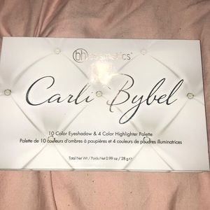 Carli Bybel eyeshadow and highlight pallet.